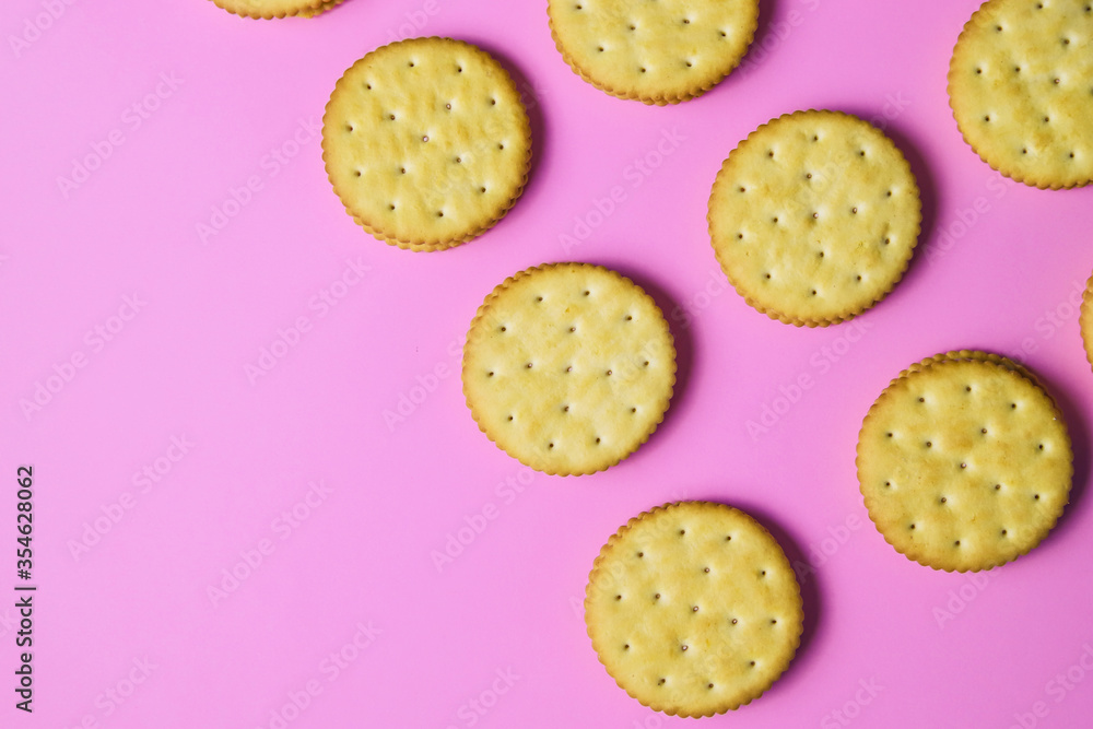 Sandwich cookies on pink background. Trendy minimal food. Simple bakery, top view Sandwich cookies on pink background. Trendy minimal food. Simple bakery, top view