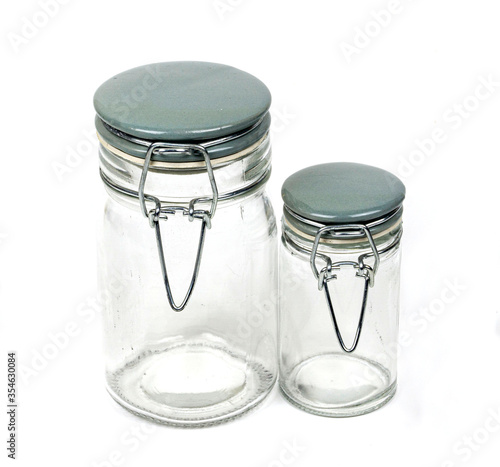 Two kitchen jars for preserevs isolated on white, natural homemade cooking