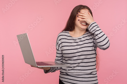 Canvastavla Oops, don't want to look! Portrait of woman covering eyes, feeling frustrated worried about software problems on laptop, failed update, shocked and scared of forbidden content