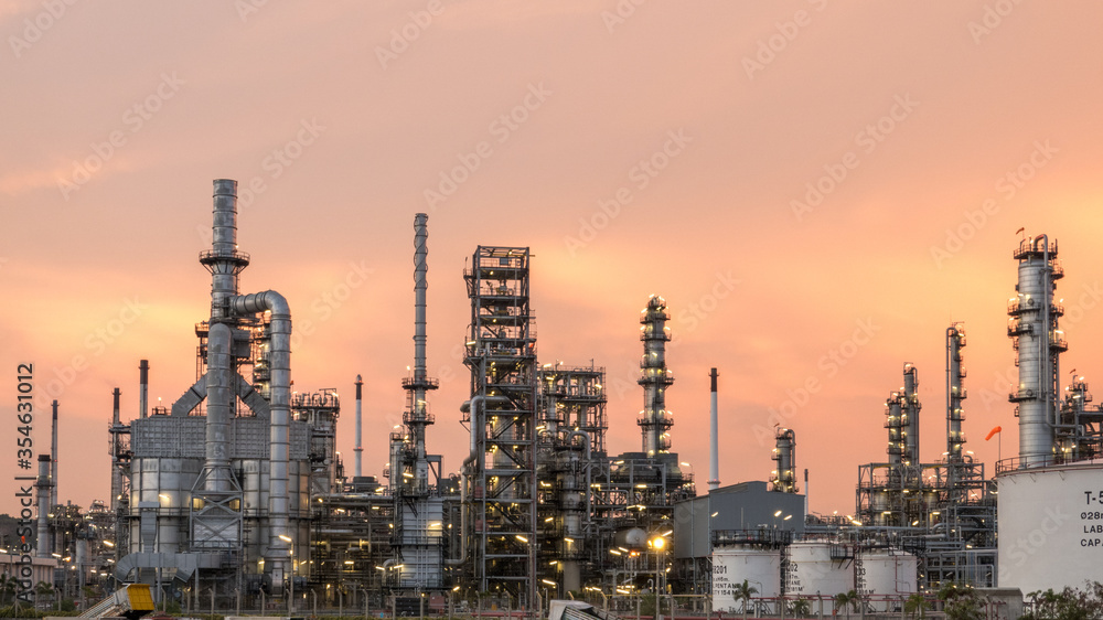 Aerial view by drone of oil petrochemical refinery plant during  sunset time