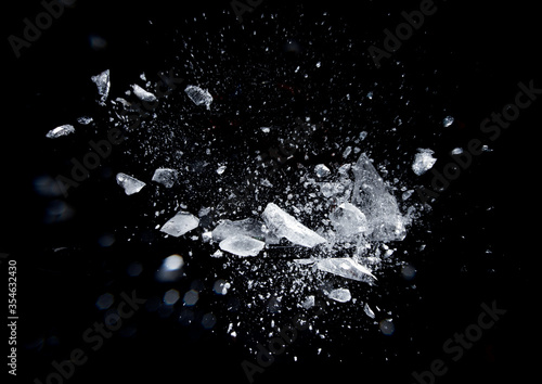 Ice broken isolated on a black background photo