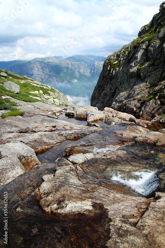 Beautiful landscape with a stream and valley in Norway. The picture was taken during a Kjerag trail in Lysefjord