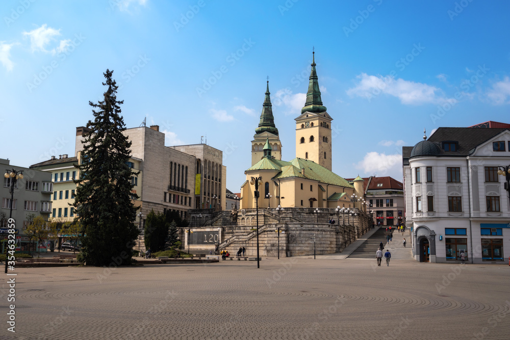 The Church of the Holy Trinity (Katedrala Najsvatejsej Trojice / Farsky kostol) and The Burian's Tower (Burianova veža) in Andrej Hlinka Square in Zilina, Slovakia