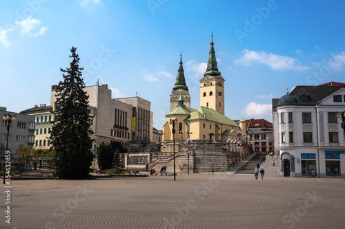 The Church of the Holy Trinity (Katedrala Najsvatejsej Trojice / Farsky kostol) and The Burian's Tower (Burianova veža) in Andrej Hlinka Square in Zilina, Slovakia