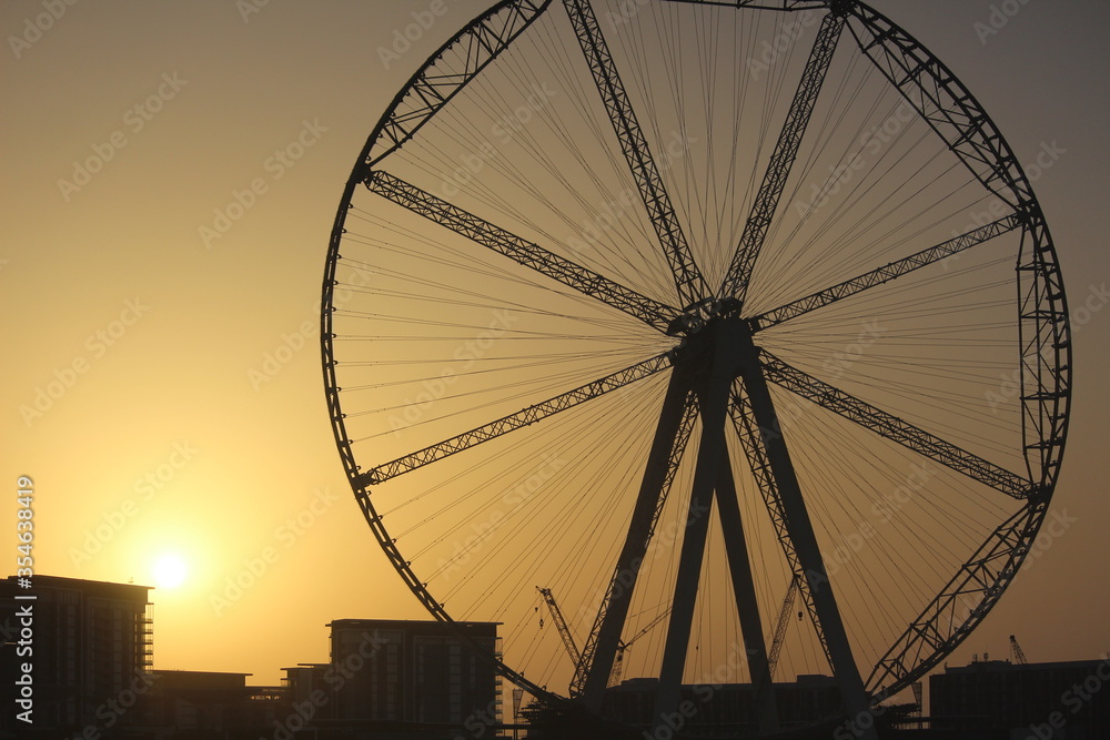 ferris wheel on sunset