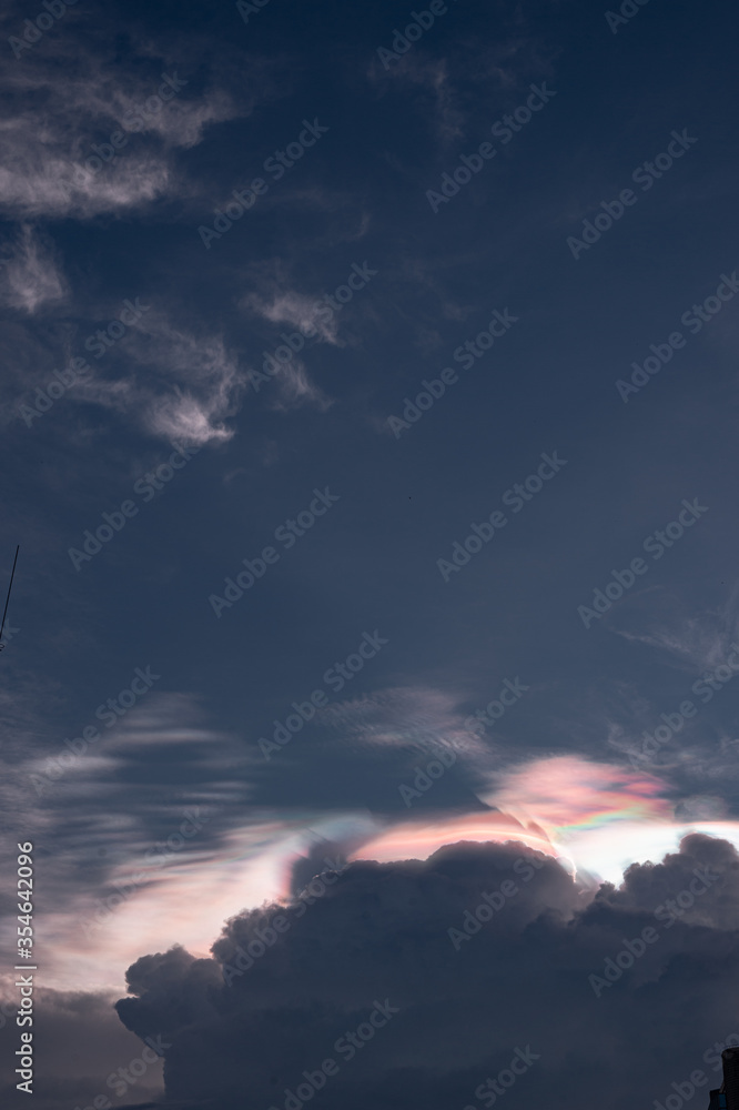 Iridescence is often the rainbow above the clouds. Especially in the evening when the sunset Iridescence is often the rainbow above the clouds. Especially in the evening when the sunset