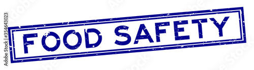 Grunge blue food safety word rubber seal stamp on white background
