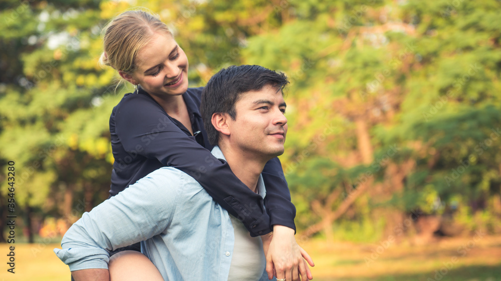 Outdoor Portrait Of Romantic Young Couple In Park Outdoor Portrait Of Romantic Young Couple In Park
