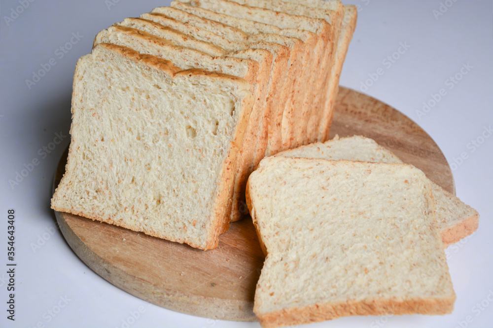 Closed up texture of fresh baked fluffy soft whole grain sliced breads Closed up texture of fresh baked fluffy soft whole grain sliced breads