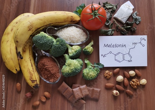 Foods high in melatonin with structural chemical formula of melatonin. Food for good sleep. Melatonin is a hormone; regulates the sleep-wake cycle. Healthy food for better sleep.
