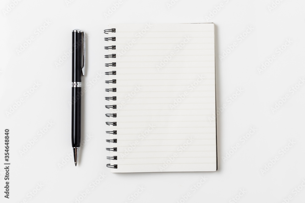 Top view, empty notebook on a white background. Top view, empty notebook on a white background.