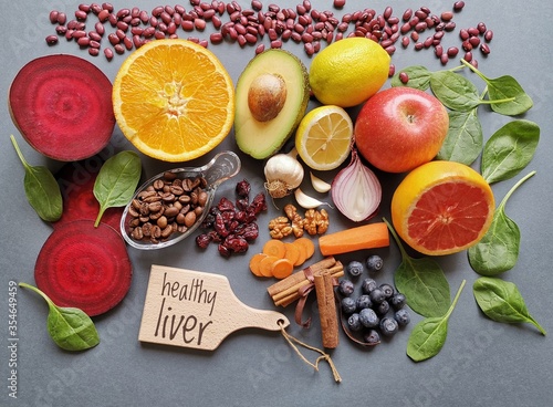 Fototapeta Naklejka Na Ścianę i Meble -  Foods for liver health. Liver detox super food after alcohol and over eating. Healthy foods for healthy liver. Concept of liver disease diet. Avocado, coffee, beetroot, blueberry, cranberry, apple.