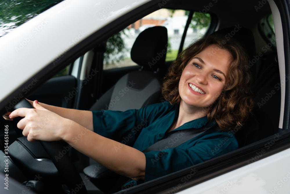 Woman driver driving a car Woman driver driving a car