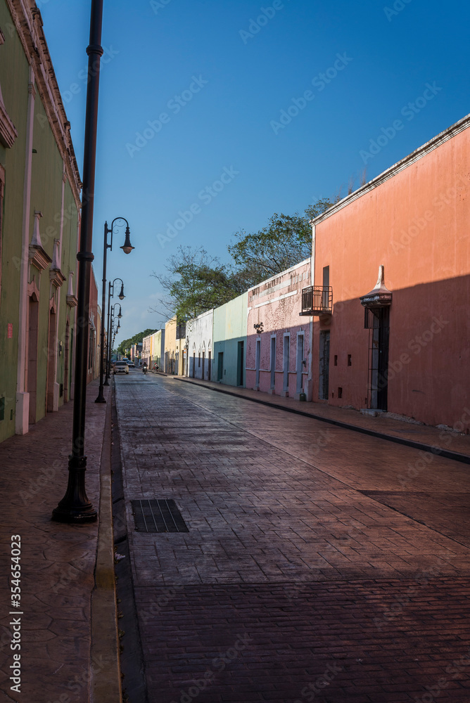 Typical street with beautiful pastel-painted houses, Valladolid, Yucatan, Mexico