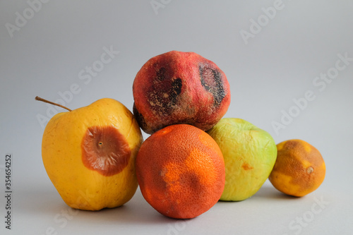 Принти на полотні lots of fruits that have gone bad