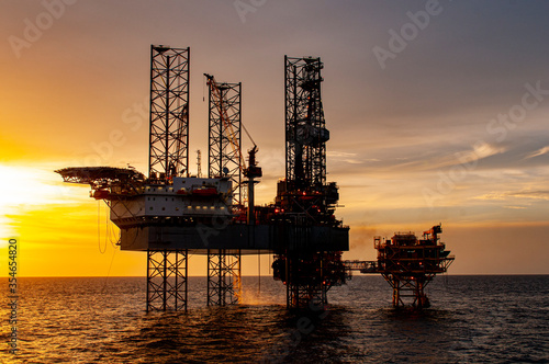 oil rig at sunset