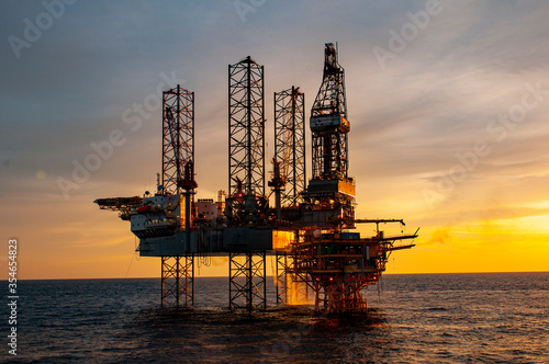oil rig at sunset