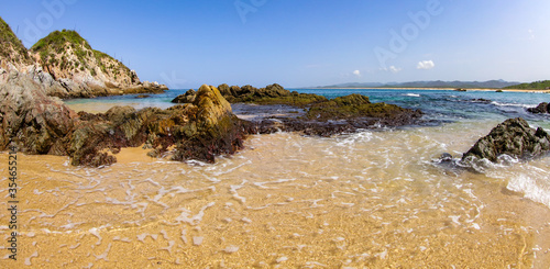 Shallow Water Near Rocks on Mayto Beach photo