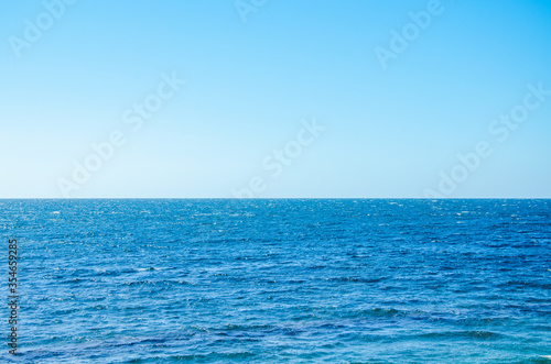 Seascape background vivid blue sea and clear sky © Annuitti