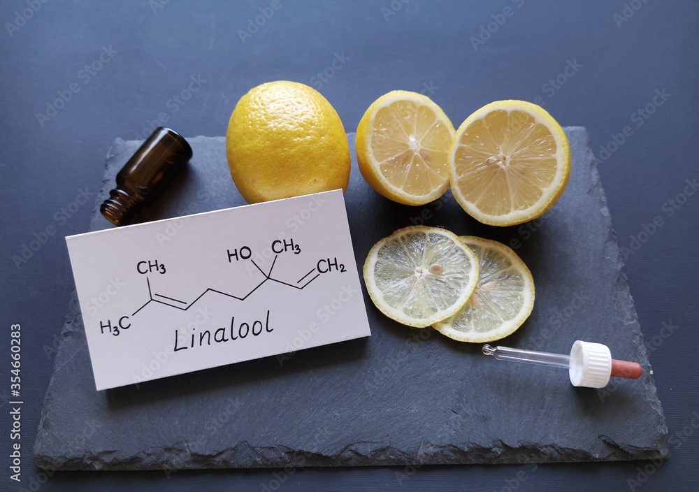 Structural chemical formula of linalool with fresh citrus fruits and a