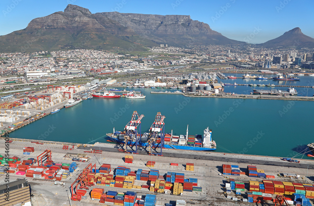 Obraz premium Cape Town, Western Cape / South Africa - 07/26/2019 - Aerial photo of Cape Town Harbour Container Terminal, CBD and Table Mountain