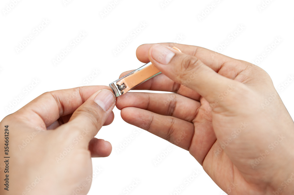 closeup of a man cutting nails is on white background with clipping path closeup of a man cutting nails is on white background with clipping path