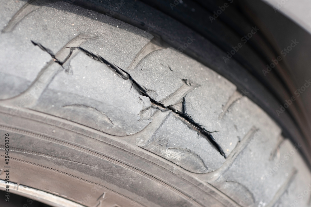 Tear marks on bald tires, car use unsafe tyre dangerous for vehicle