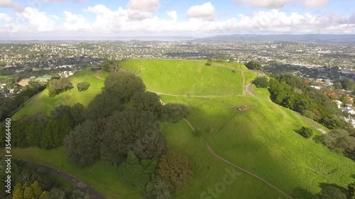 An aerial view shows tourists visiting Maungawhau, the volcanic peak of Mount Eden in Auckland, New Zealand. photo