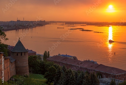 Russian fortress monastery at sunset sun.