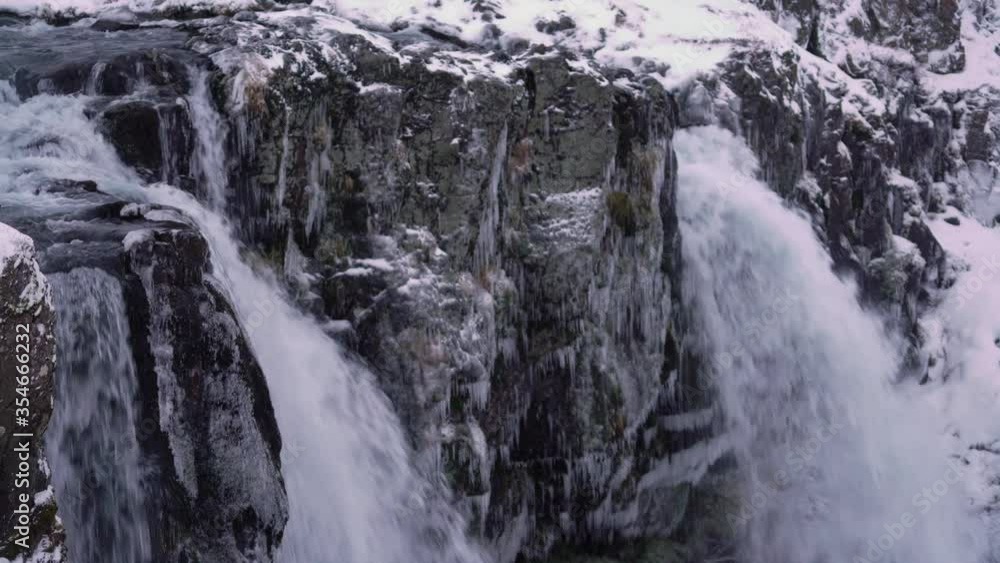 Waterfalls are seen in close-up on Kirkjufell Mountain on the Snæfellsnes Peninsula of Iceland. Waterfalls are seen in close-up on Kirkjufell Mountain on the Snæfellsnes Peninsula of Iceland.