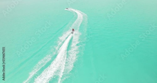 Tourists go jet-skiing in Maldives. photo