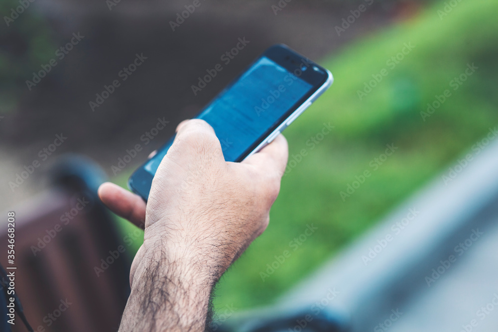 man holding a phone in his hands