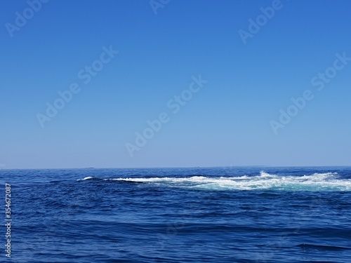 wave breaking on underwater reef in nordland  outside the island of Heroy