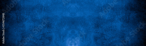 Old wall pattern texture cement blue dark abstract blue color design are light with black gradient background.