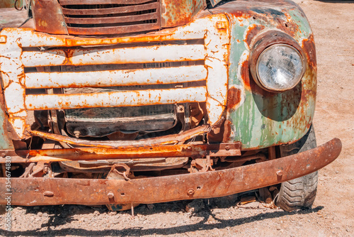 Old green van, rusted by the time