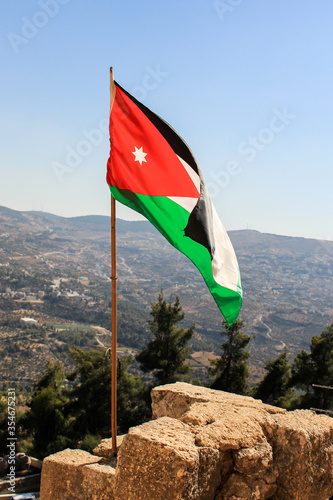 A view of the Jordanian flag flying over Ajloun in Jordan