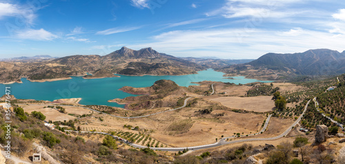 Water reservoir (embalse) of Zahara-el Gastor, which gets its water from River Guadalete. Panorama photo taken from Zahara de la Sierra, a white village located in Cadiz, Andalusia, Spain photo