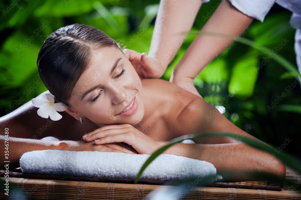 portrait of young beautiful woman in spa environment. portrait of young beautiful woman in spa environment.