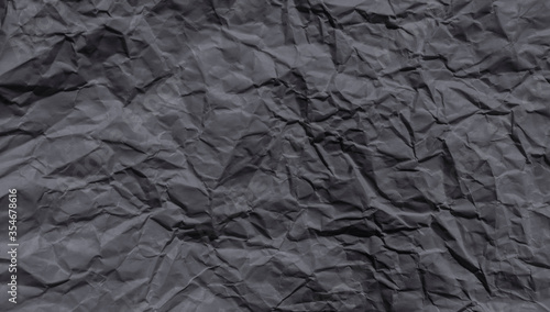 Sheet of black crumpled paper useful as a background.