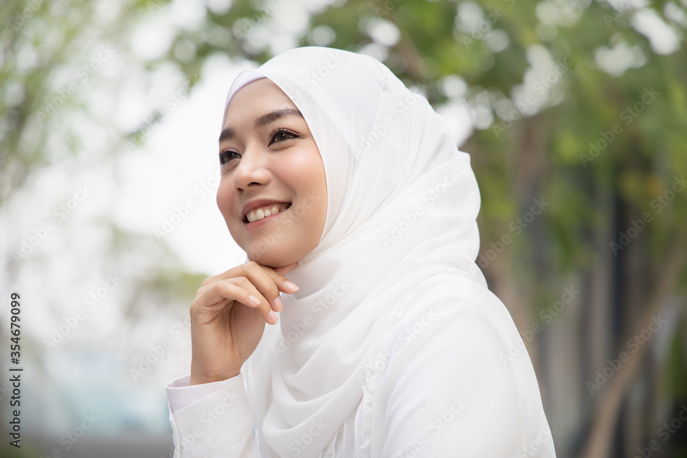 Muslim woman thinking, having good idea Muslim woman thinking, having good idea