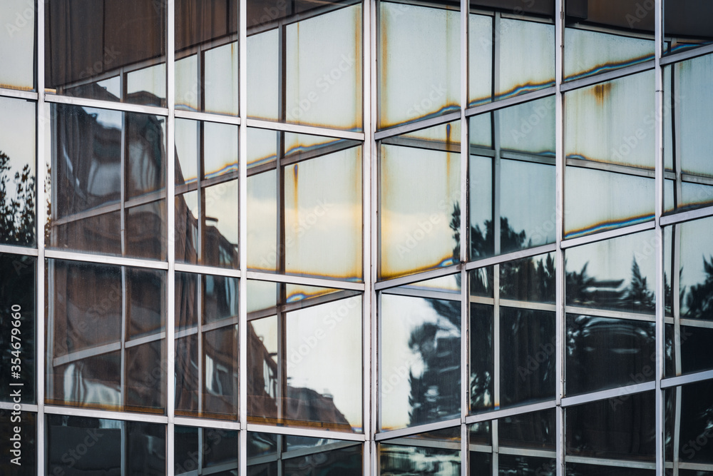 Obraz premium Reflections on a glass facade