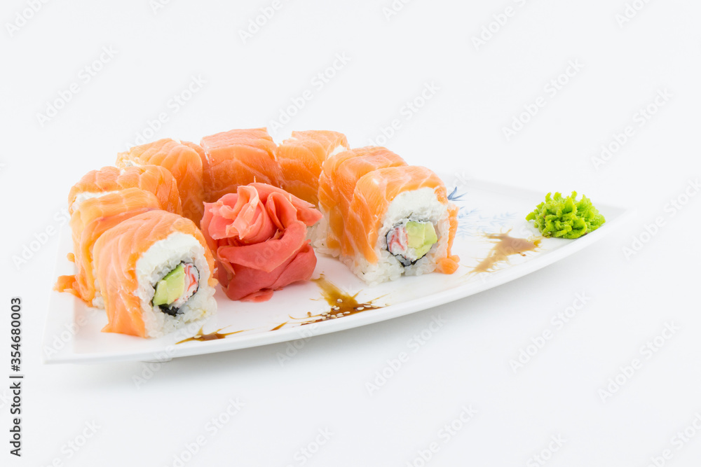 Close-up of traditional Japanese sushi on a white background. Design of the sushi bar menu. Japanese cuisine.
