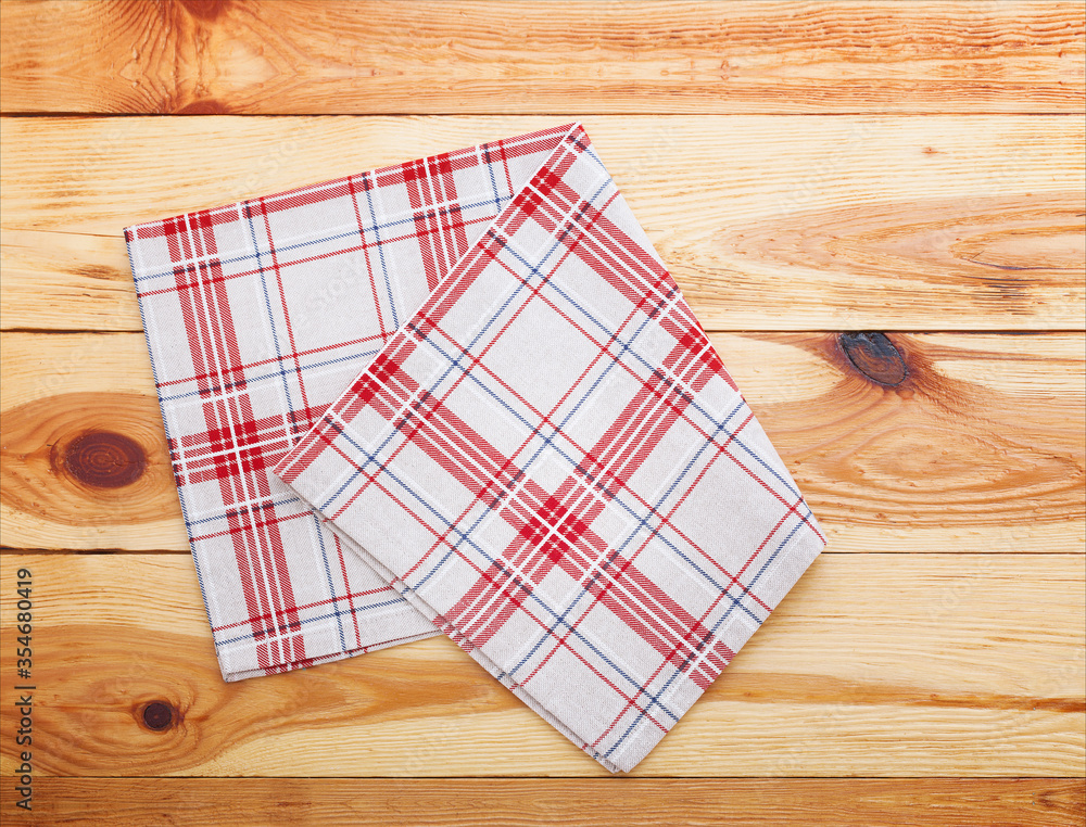 Empty wooden deck table with table cloth Empty wooden deck table with table cloth