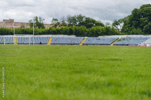 stadium, close up on grass. empty soccer football green field