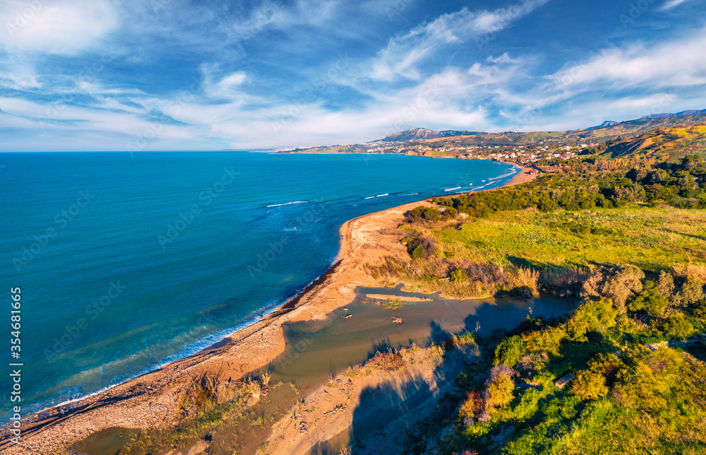 View from flying drone. Breathtaking morning view of Sciacca town, province of Agrigento, southwestern coast of Sicily, Italy, Europe. Beautiful summer seascape of Mediterranean sea. View from flying drone. Breathtaking morning view of Sciacca town, province of Agrigento, southwestern coast of Sicily, Italy, Europe. Beautiful summer seascape of Mediterranean sea.