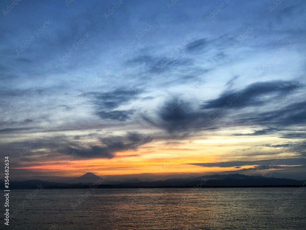 sunset over the sea with Mount Fuji view.