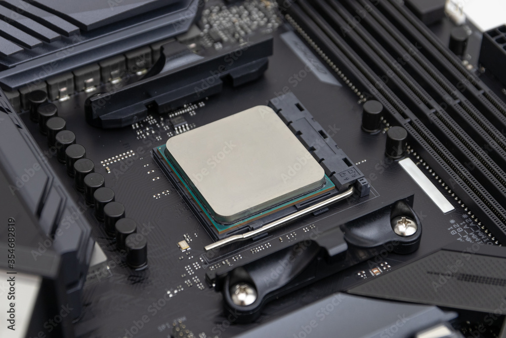 7 nm Computer processor (CPU) inserted in a motherboard socket 7 nm Computer processor (CPU) inserted in a motherboard socket