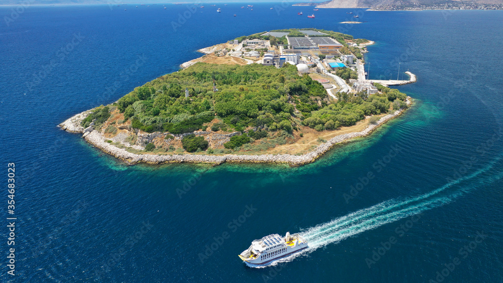 Aerial drone high altitude photo of small island of Psitaleia a latest technology industrial sewage plant near port of Piraeus, Attica, Greece