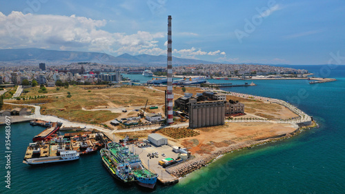 Φωτογραφία Aerial drone photo of old abandoned fertiliser factory in Piraeus port where tom