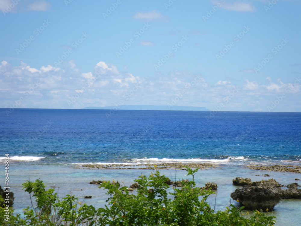 pati beach, on Pati Point is the easternmost point of Guam with the view of Rota island in the background pati beach, on Pati Point is the easternmost point of Guam with the view of Rota island in the background